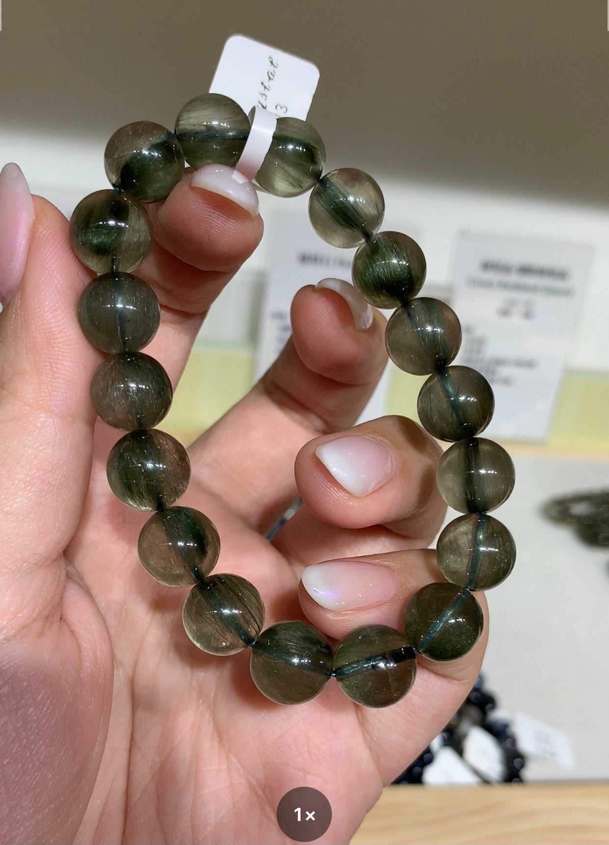 Transparent cat's eye green hair crystal 10.8mm