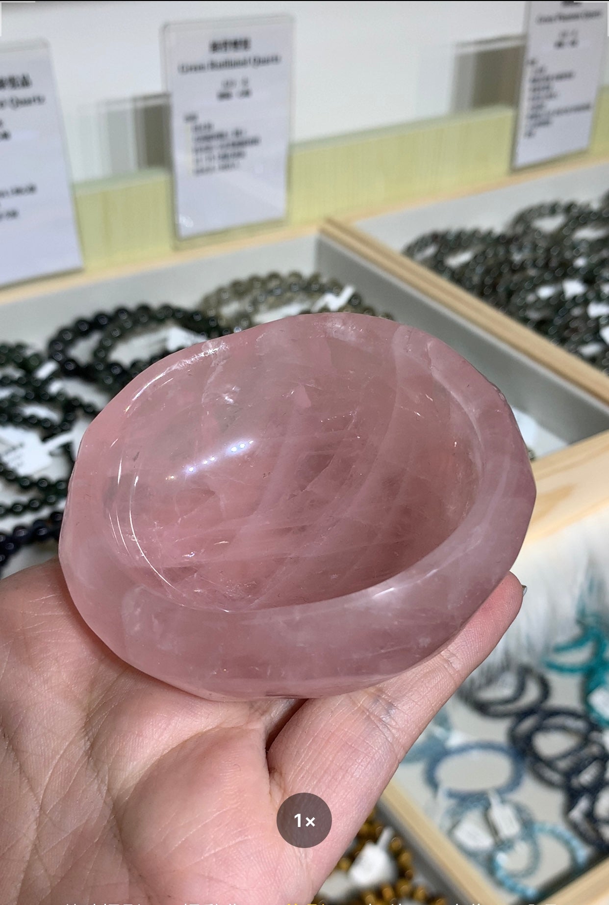 Pink crystal bowl with log base