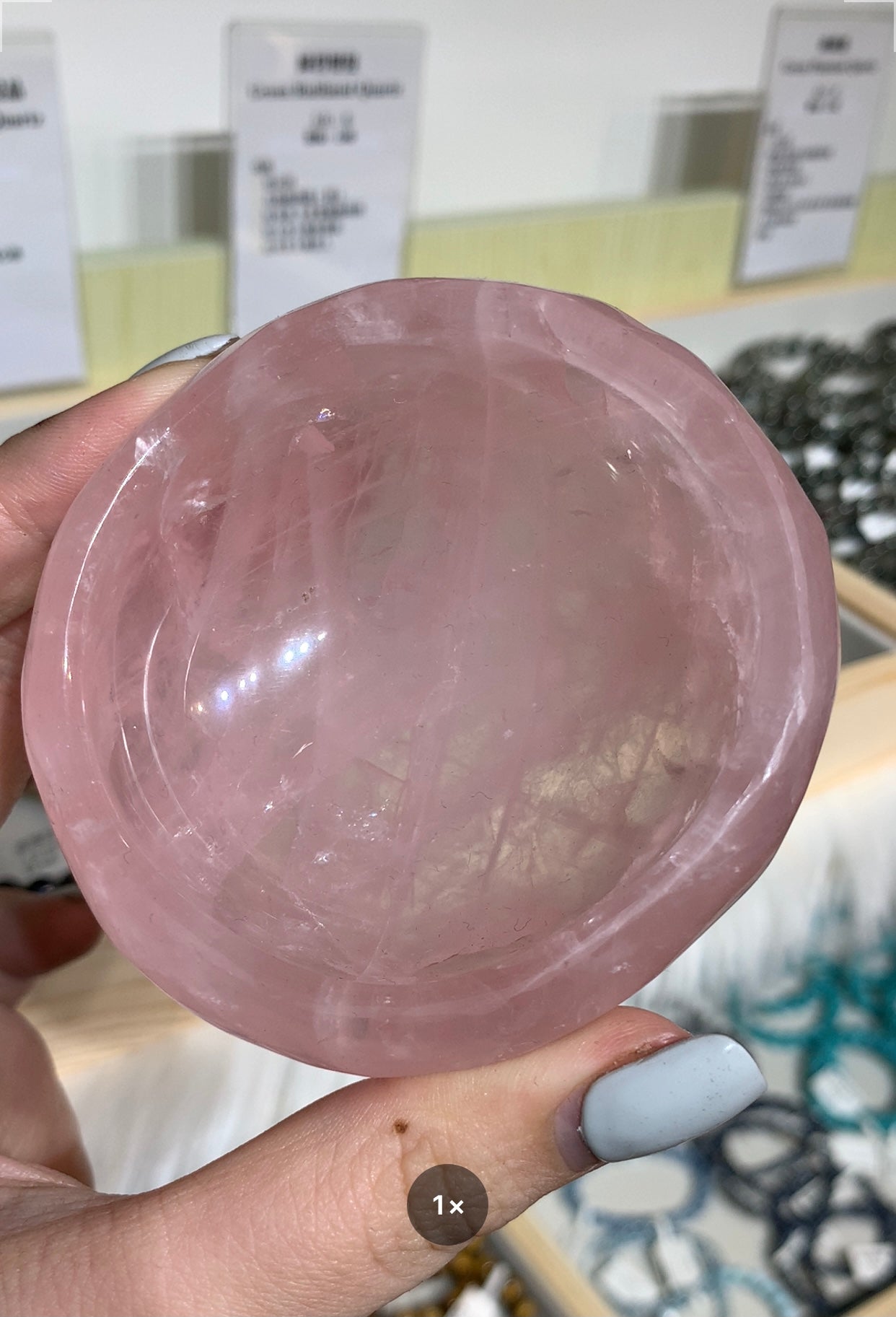 Pink crystal bowl with log base